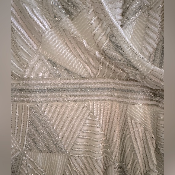LARA Designs size 16. Dress is white sequined w/white and silver sequins. - Picture 5 of 5